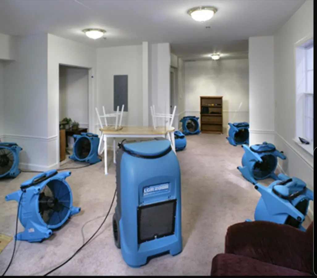 Air movers and dehumidifier setup for Water Damage Restoration in Hereford